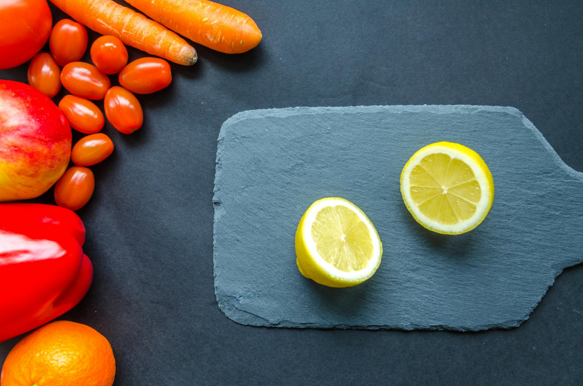 sliced lemon on blue chopping board